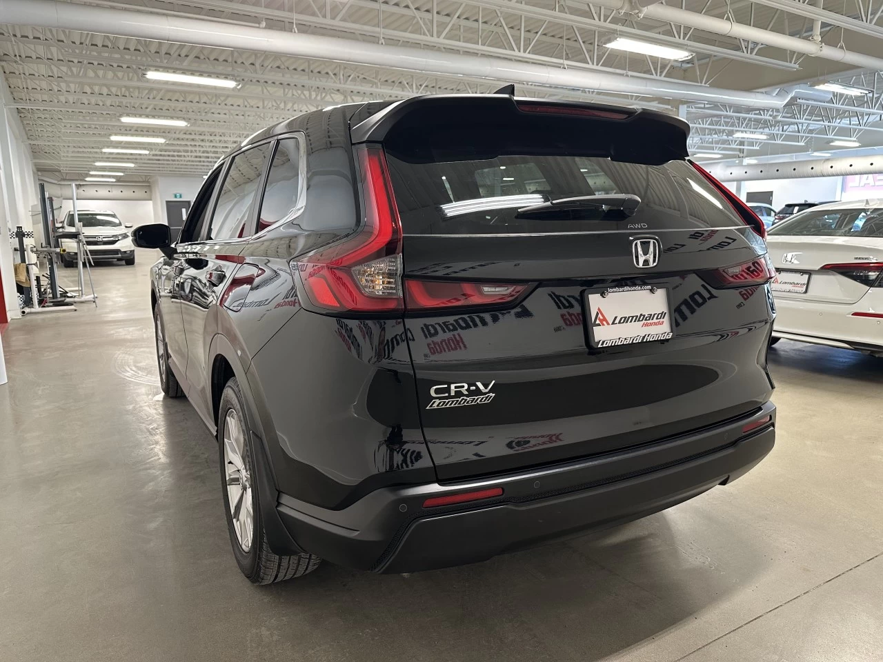 2023 Honda CR-V EX-L https://www.lombardihonda.com/resize/b990ff35b810a3abc0cc817b2ca24889-1