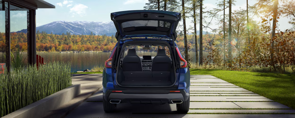 CR-V 2024 trunk capacity. Generous cargo volume CR-V. Honda CR-V trunk modularity. Convenient storage space CR-V 2024. Flexible trunk layout CR-V. Easy trunk access CR-V. Intelligent trunk organization CR-V 2024. Cargo loading safety CR-V. Trunk securing systems CR-V. CR-V 2024 trunk storage options.