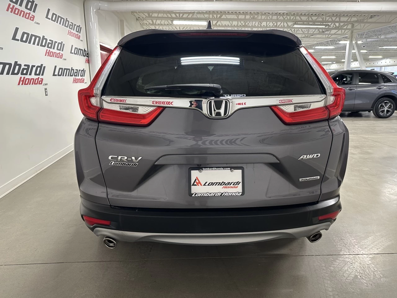 2019 Honda CR-V
                                                    Touring Image principale