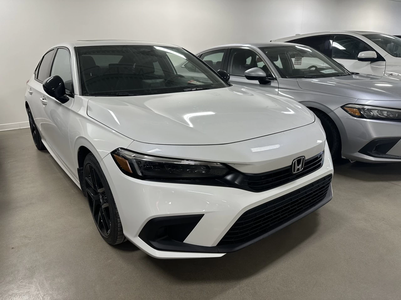 2022 Honda Civic Sport https://www.lombardihonda.com/resize/b990ff35b810a3abc0cc817b2ca24889-1