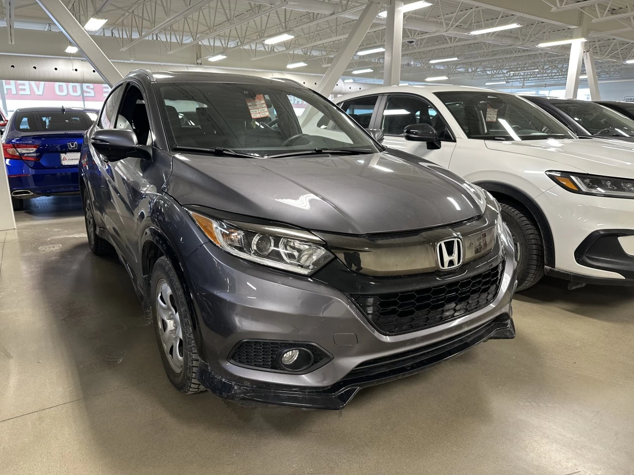 2021 Honda HR-V Sport https://www.lombardihonda.com/resize/b990ff35b810a3abc0cc817b2ca24889-1