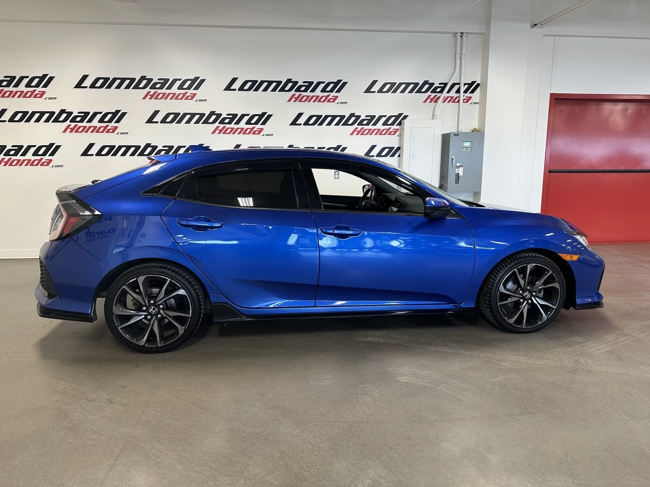 2019 Honda Civic Sport https://www.lombardihonda.com/resize/b990ff35b810a3abc0cc817b2ca24889-1