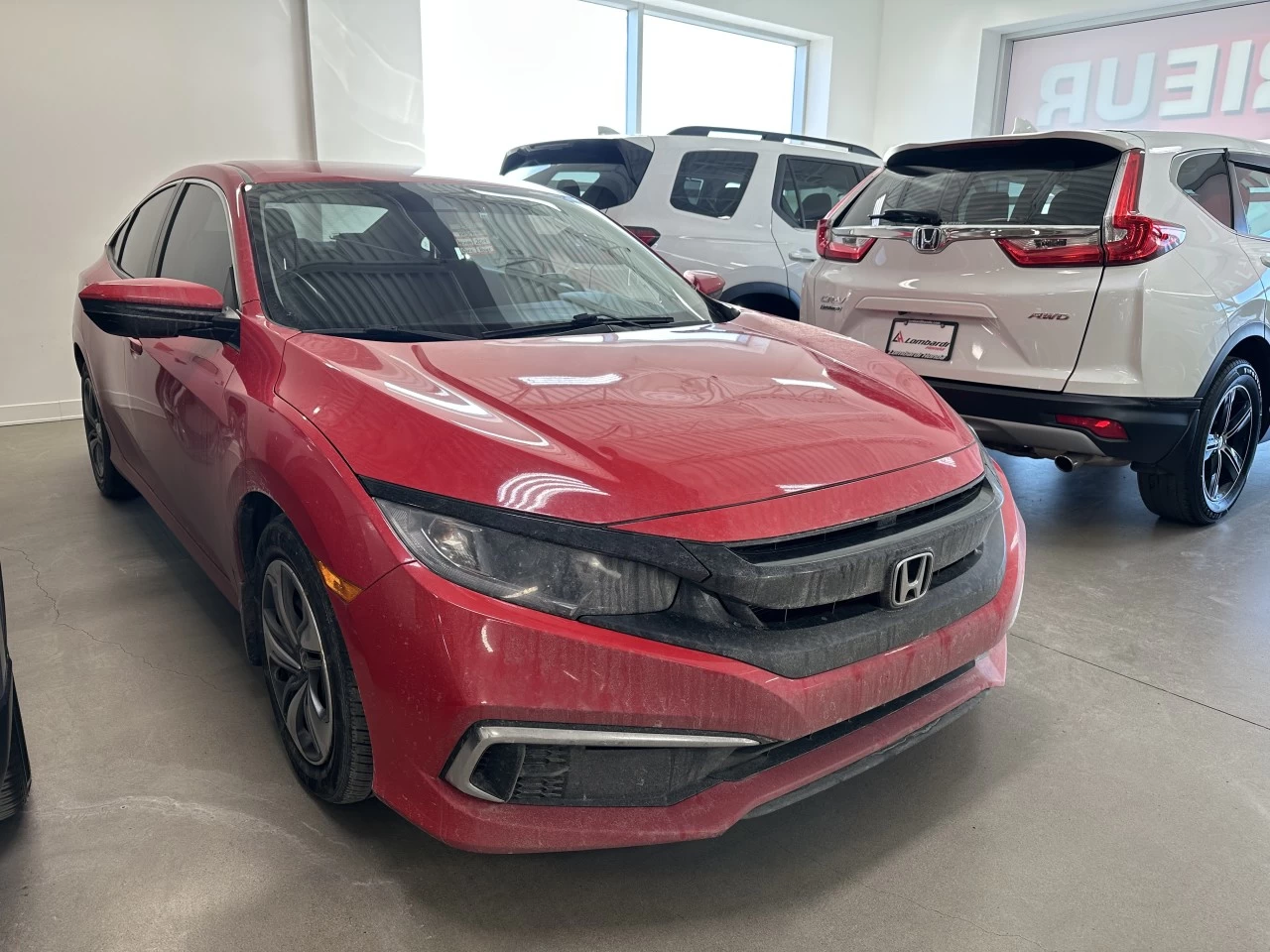 2019 Honda Civic LX https://www.lombardihonda.com/resize/b990ff35b810a3abc0cc817b2ca24889-1