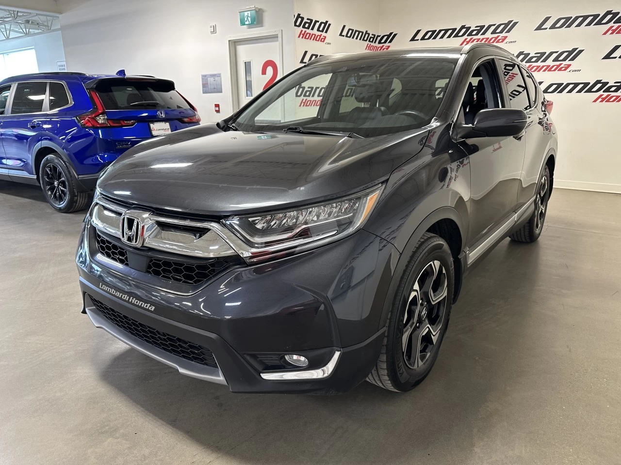 2019 Honda CR-V
                                                    Touring Image principale