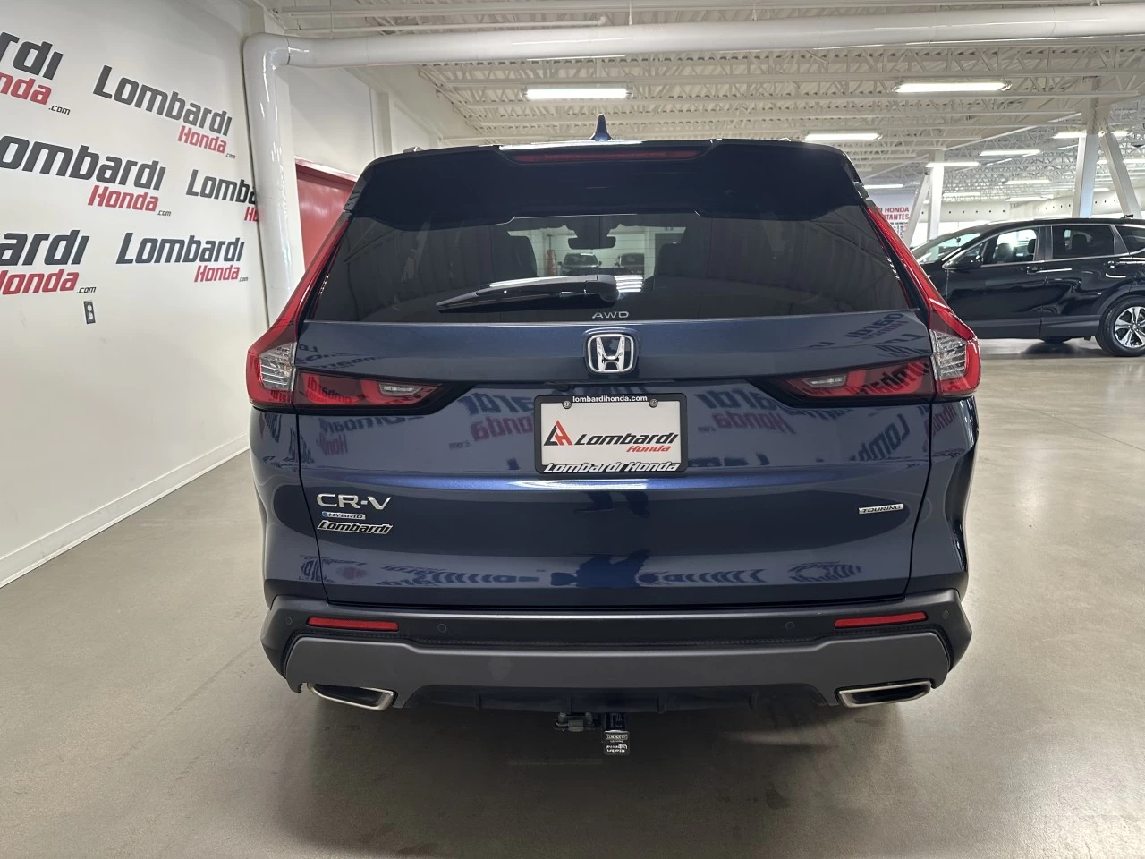 2023 Honda CR-V
                                                    Touring Image principale