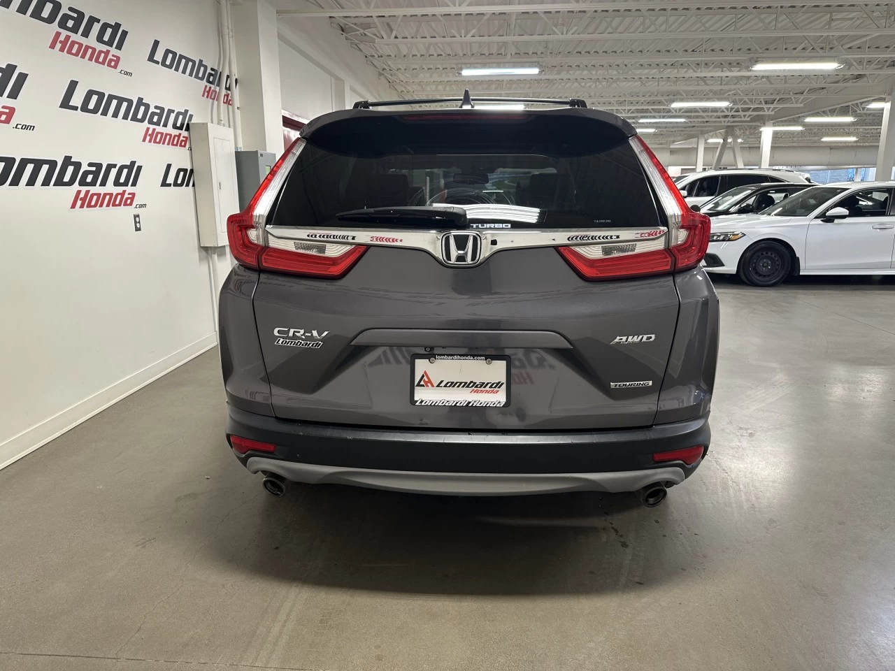 2018 Honda CR-V
                                                    Touring Image principale