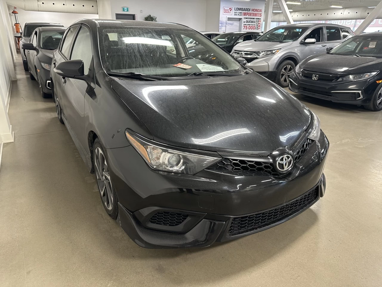 2017 Toyota Corolla 4dr HB https://www.lombardihonda.com/resize/b990ff35b810a3abc0cc817b2ca24889-1