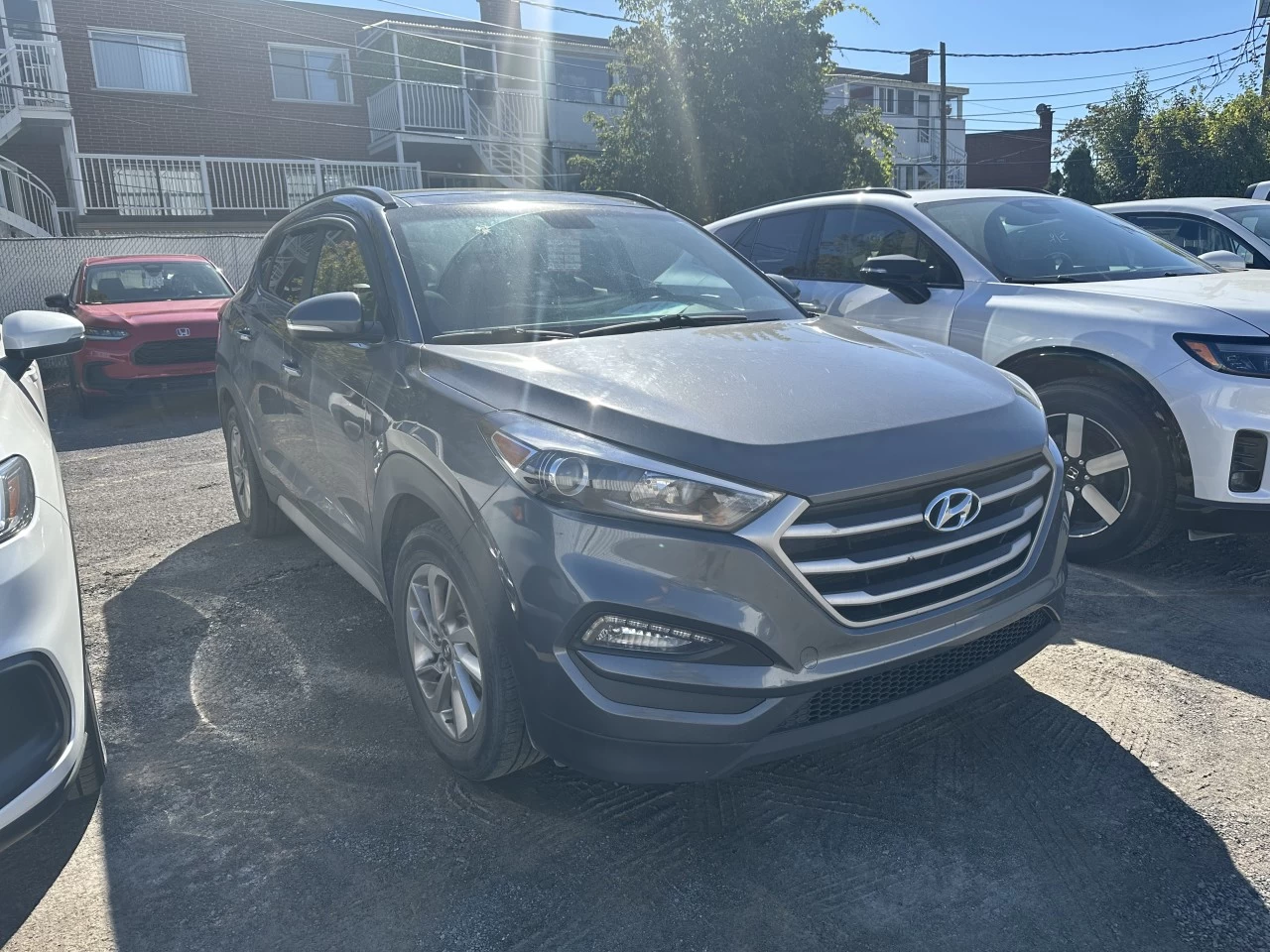 2018 Hyundai Tucson SE https://www.lombardihonda.com/resize/b990ff35b810a3abc0cc817b2ca24889-1