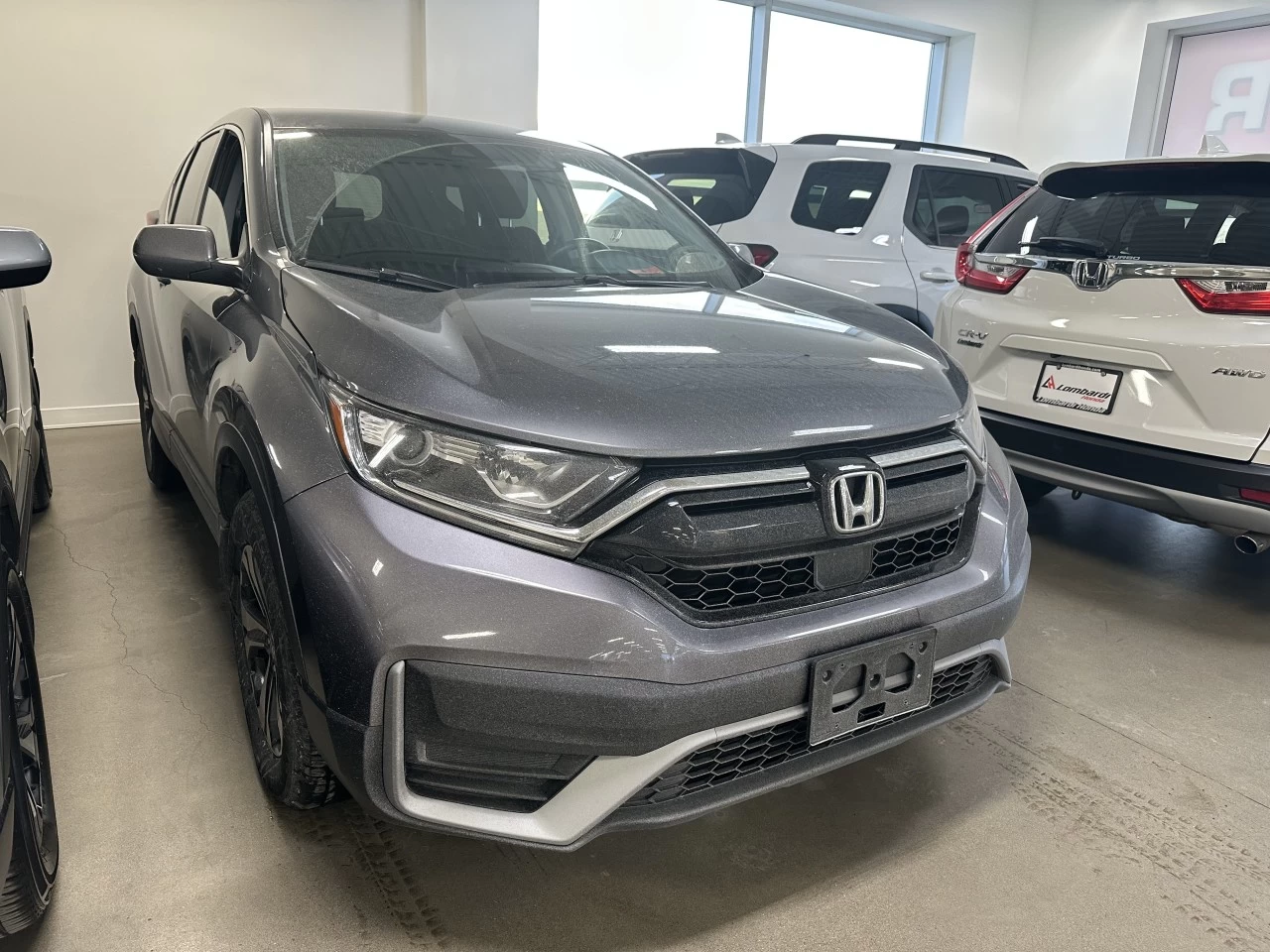 2021 Honda CR-V LX https://www.lombardihonda.com/resize/b990ff35b810a3abc0cc817b2ca24889-1