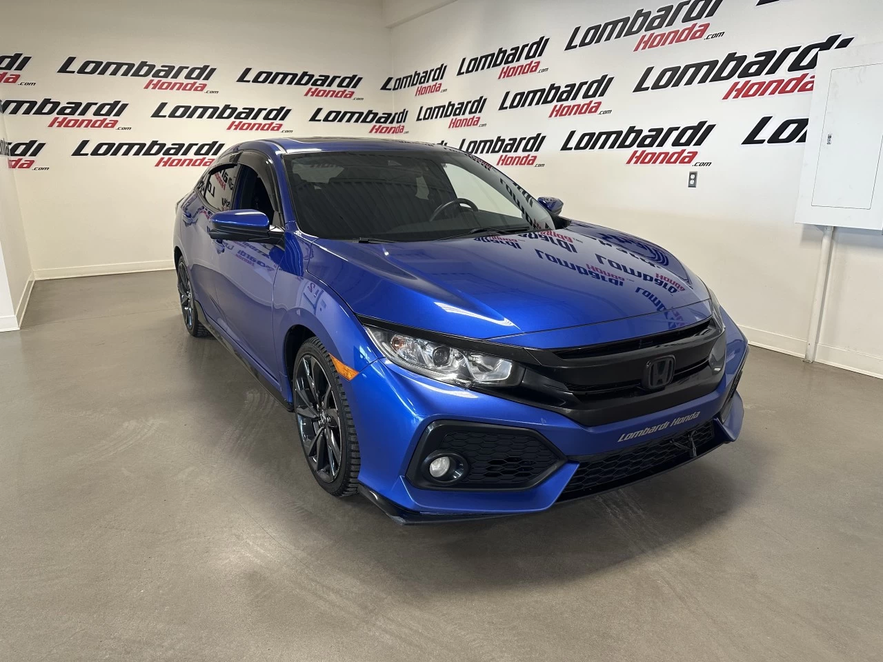 2019 Honda Civic Sport https://www.lombardihonda.com/resize/b990ff35b810a3abc0cc817b2ca24889-1