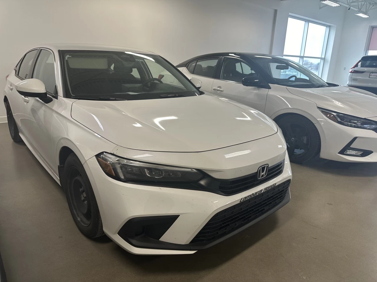 2022 Honda Civic LX https://www.lombardihonda.com/resize/b990ff35b810a3abc0cc817b2ca24889-1