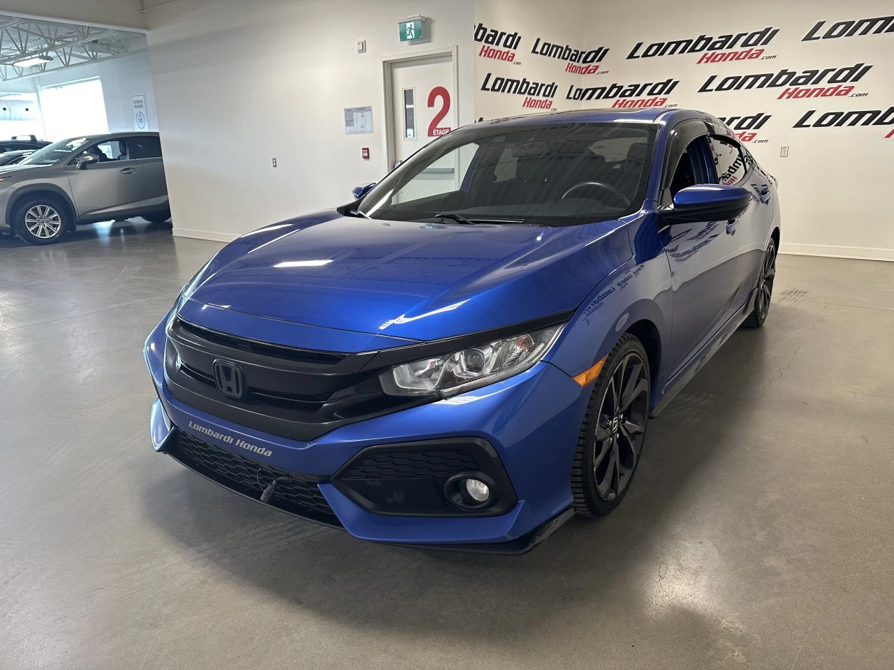 2019 Honda Civic Sport https://www.lombardihonda.com/resize/b990ff35b810a3abc0cc817b2ca24889-1