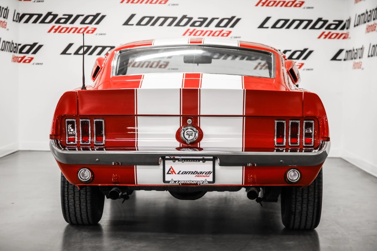 1967 Ford Mustang Fastback https://www.lombardihonda.com/resize/b990ff35b810a3abc0cc817b2ca24889-1