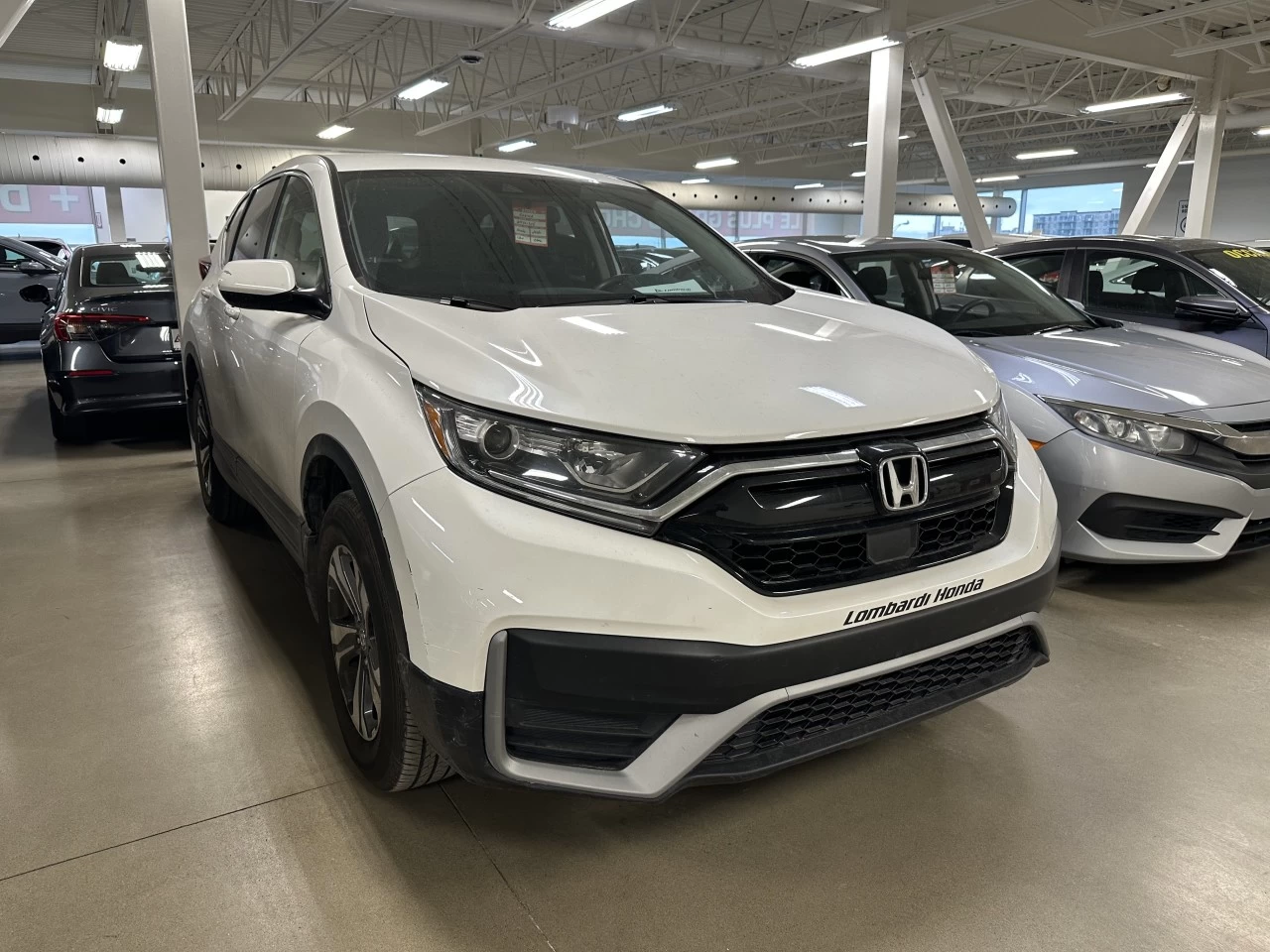 2022 Honda CR-V LX https://www.lombardihonda.com/resize/b990ff35b810a3abc0cc817b2ca24889-1