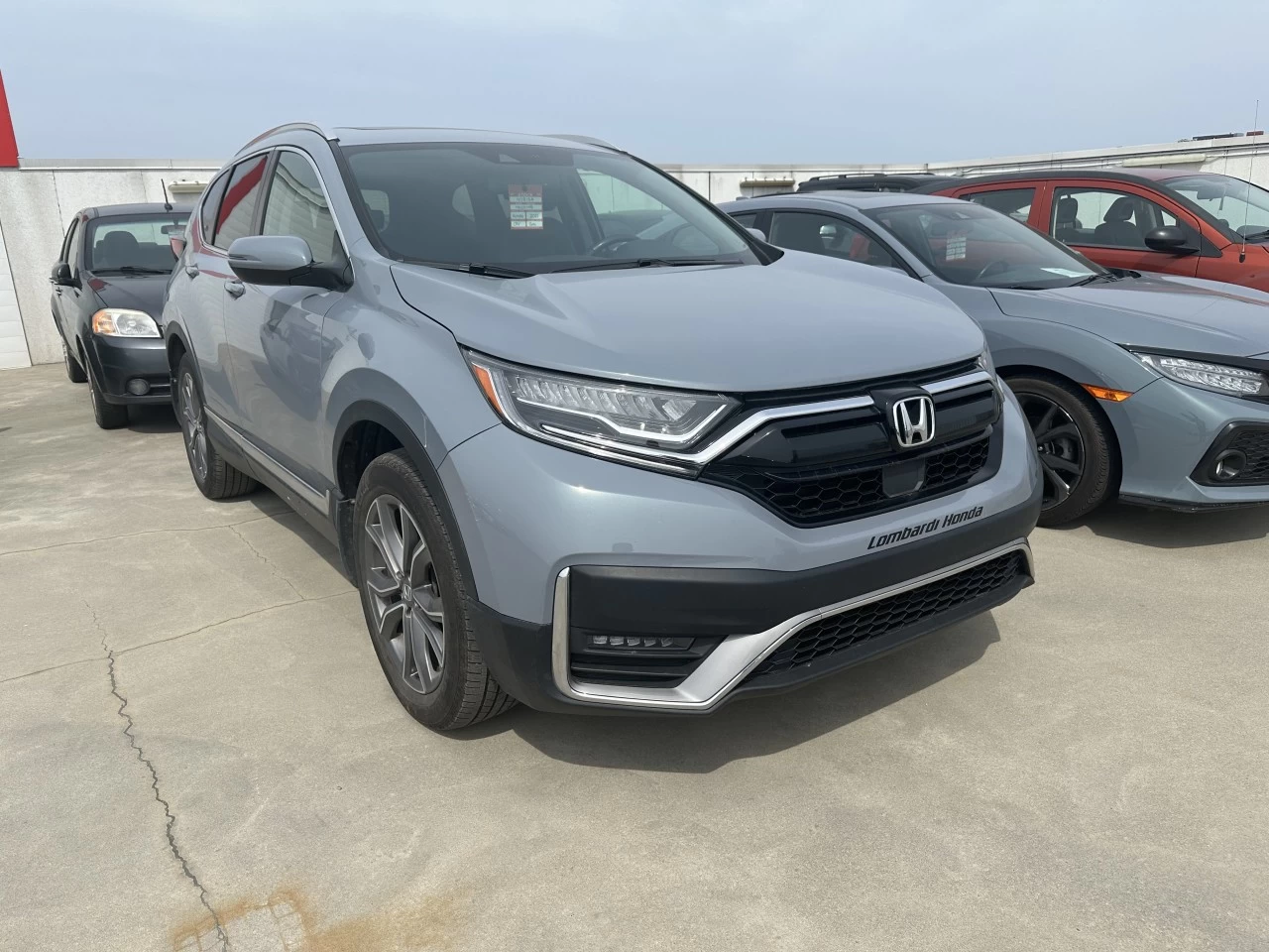 2021 Honda CR-V Touring https://www.lombardihonda.com/resize/b990ff35b810a3abc0cc817b2ca24889-1