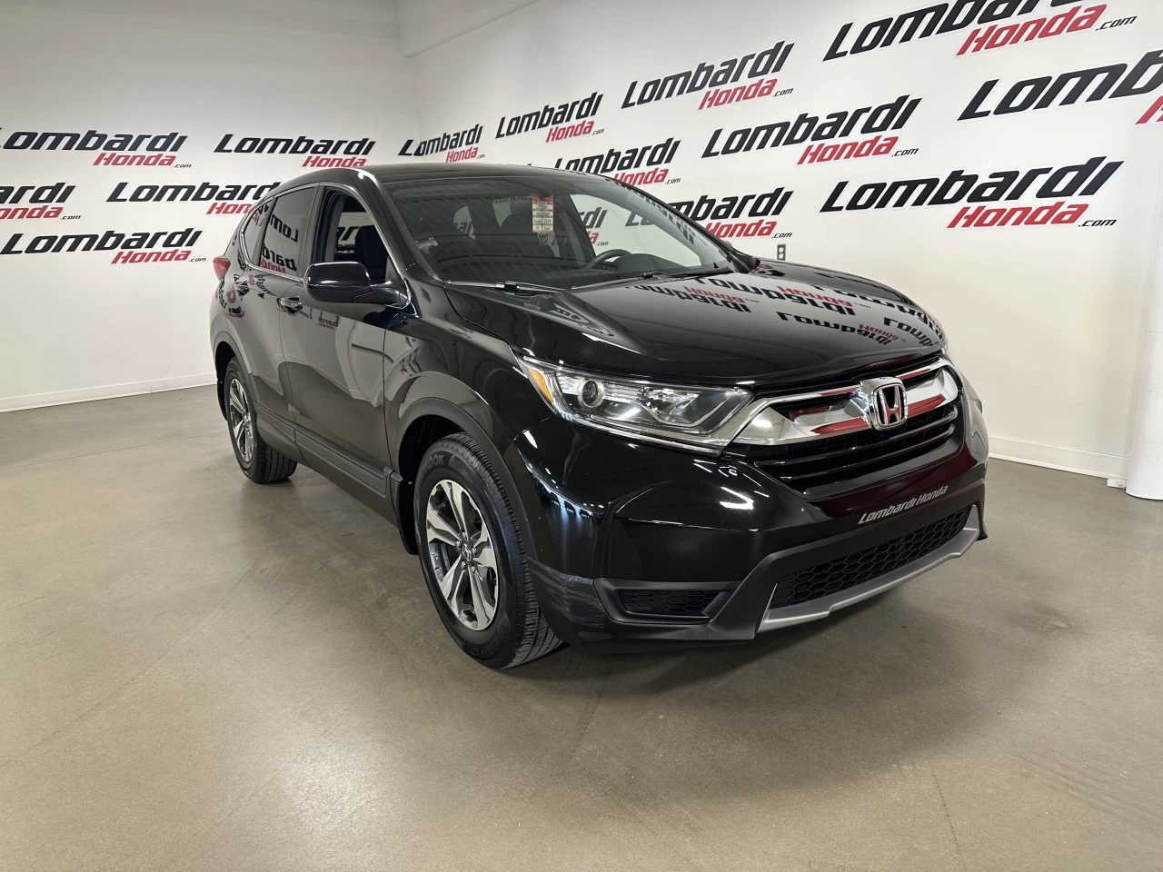 2019 Honda CR-V LX https://www.lombardihonda.com/resize/b990ff35b810a3abc0cc817b2ca24889-1